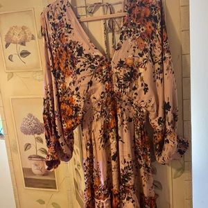 Floral dress with deep v cut and open back